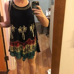 Worn as a tropical sun dress / swimsuit coverup